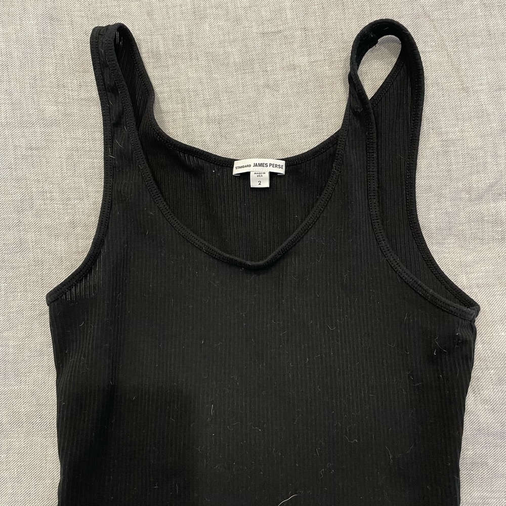 Classic black ribbed daily tank top.